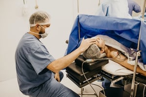 doctor helping a patient