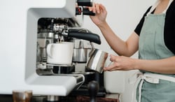 person serving coffee