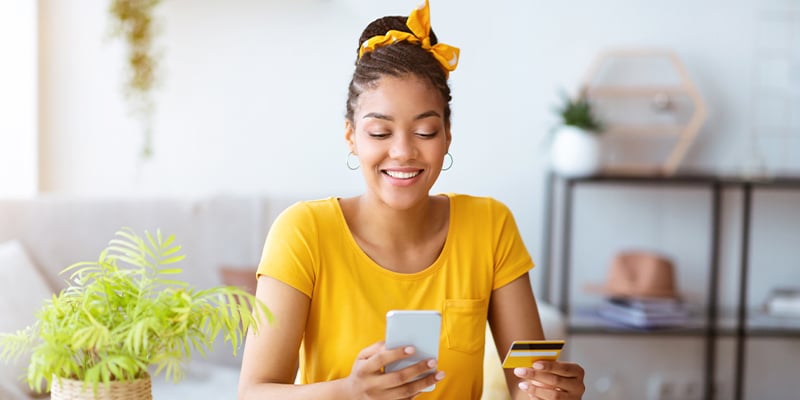 Woman shopping online through her smartphone 